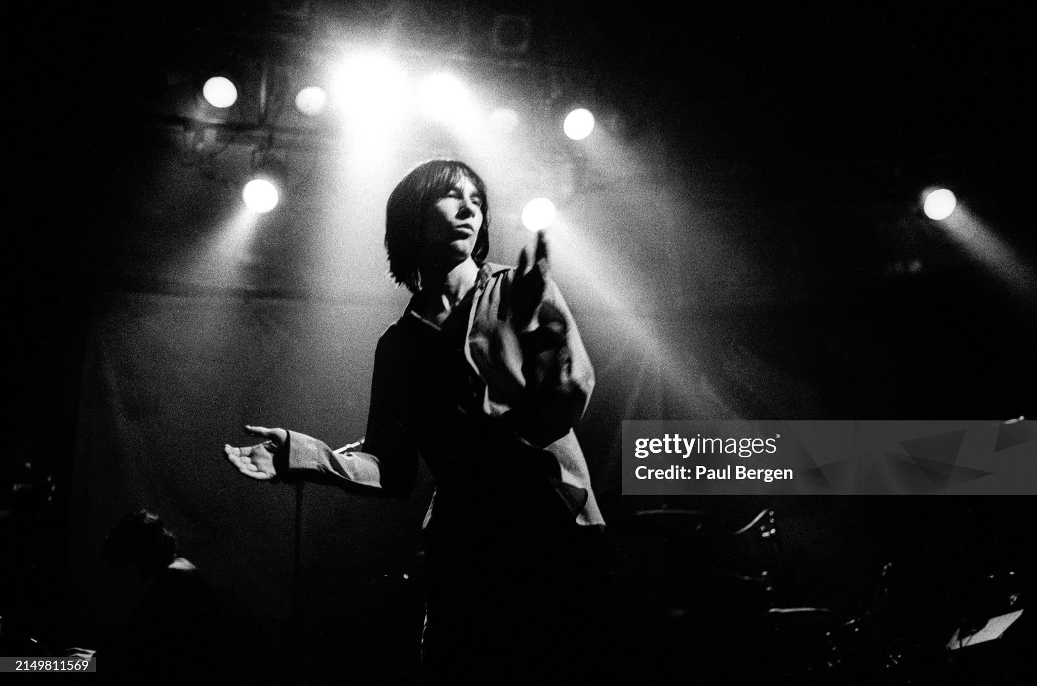 AMSTERDAM, NETHERLANDS - JANUARY 11: Bobby Gillespie of Primal Scream performs live on stage at Paradiso on January 11, 1992 in Amsterdam, Netherlands. (Photo by Paul Bergen/Redferns)