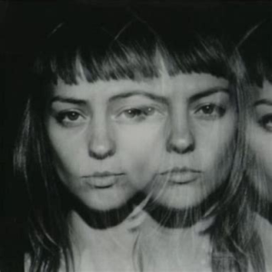 Angel Olsen<br><span class="loop-subtitle">Unfucktheworld</span>